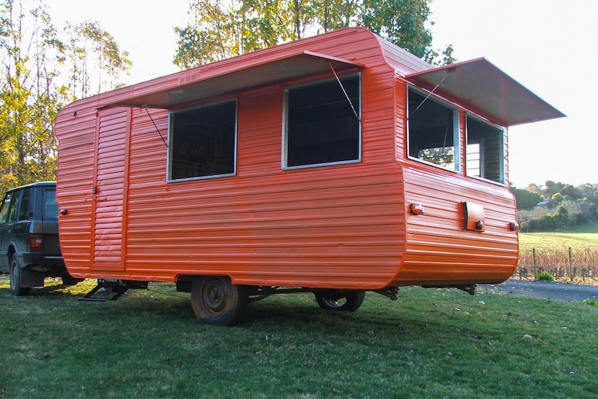 The orange tuckshop van will travel on Tasmanian roads to bring nostalgia from the 1970s.
