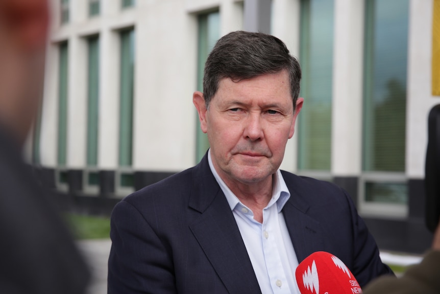 Kevin Andrews outside Parliament House.