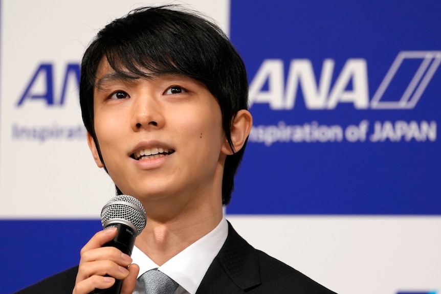 Yuzuru Hanyu of Japan, speaks during a press conference