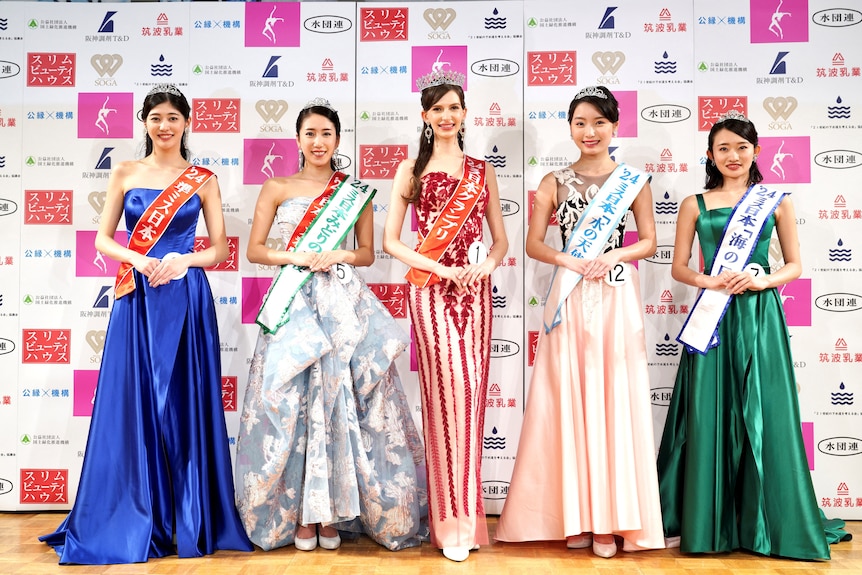Karolina Shiino, the winner of the Miss Japan 2024, poses with other prize winners. 