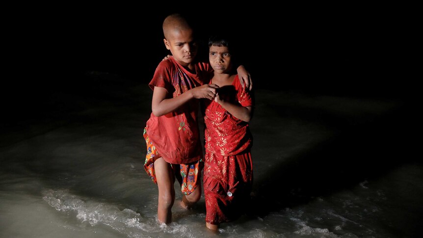 Rohingya refugee sisters, who just arrived under the cover of darkness.