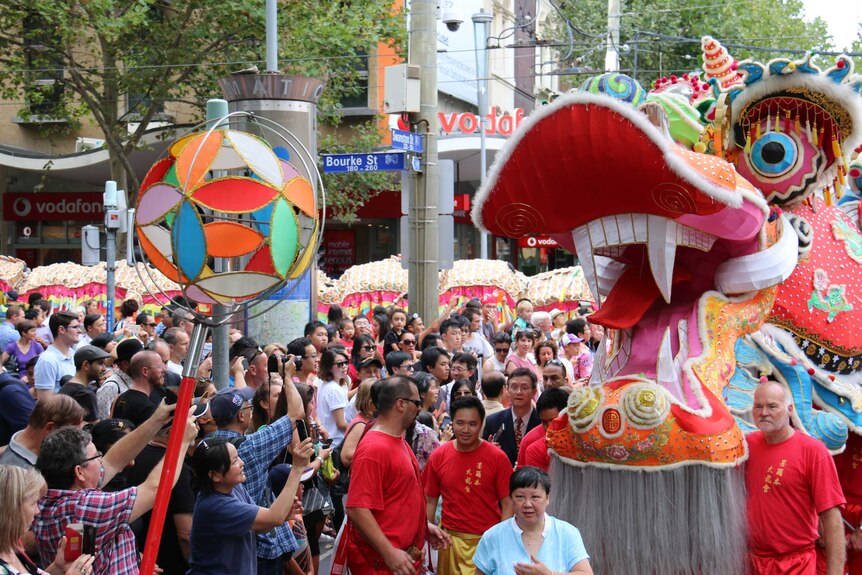 Crowd gathers around the Dragon during Melbourne's Chinese New Year celebrations