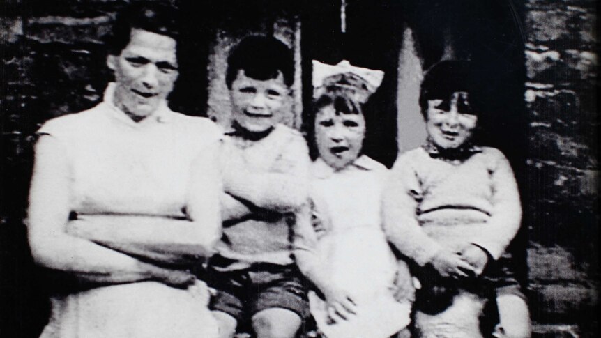 Jean McConville (L) with some of her 10 children, including eldest daughter Helen McKendry (2R).