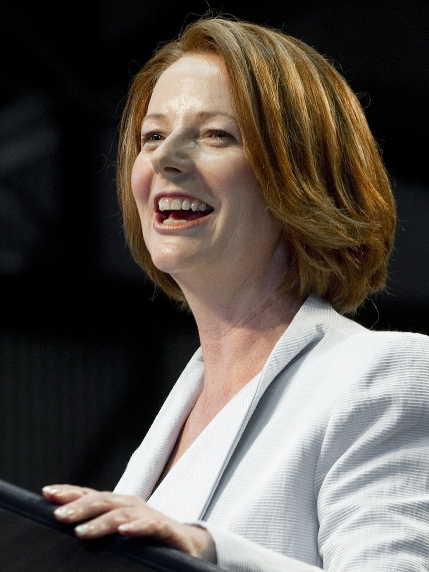 Australian Prime Minister Julia Gillard speaks to Australian troops and US Marines at RAAF Base Darwin.