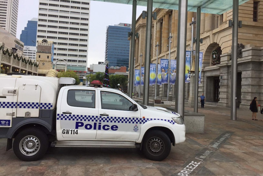 A WA Police vehicle parked outside the old post office building in Forrest Place in Perth's CBD.