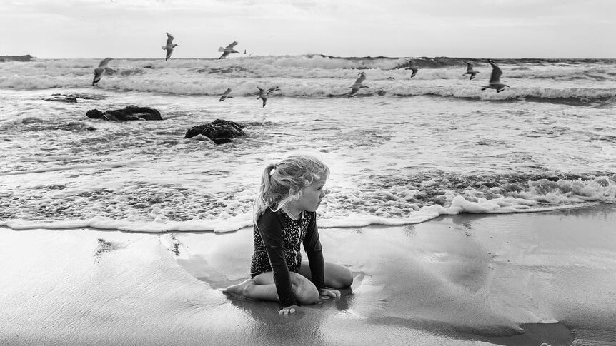 A young girl at the beach.