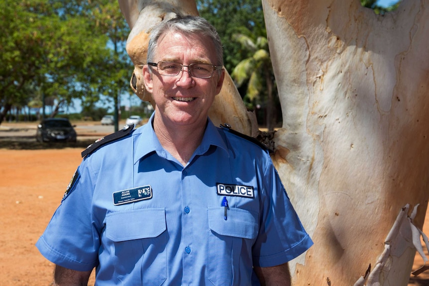 A mid shot of a smiling WA Police Commander Allan Adams standing outdoors.