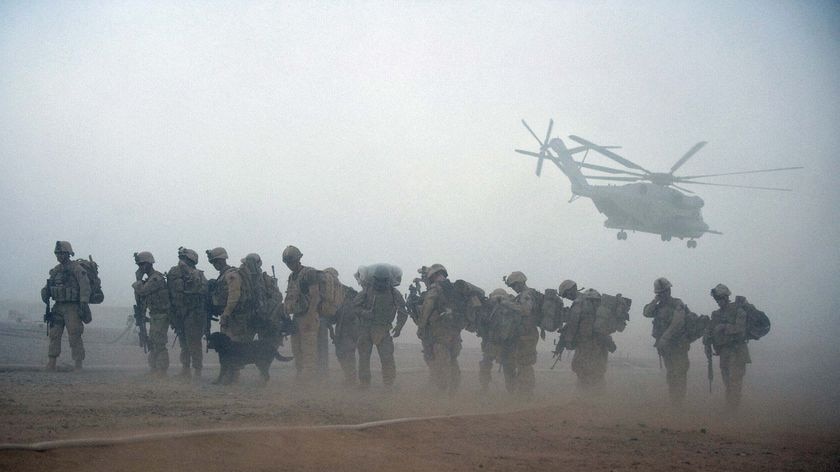 US Marines wait for helicopter transport