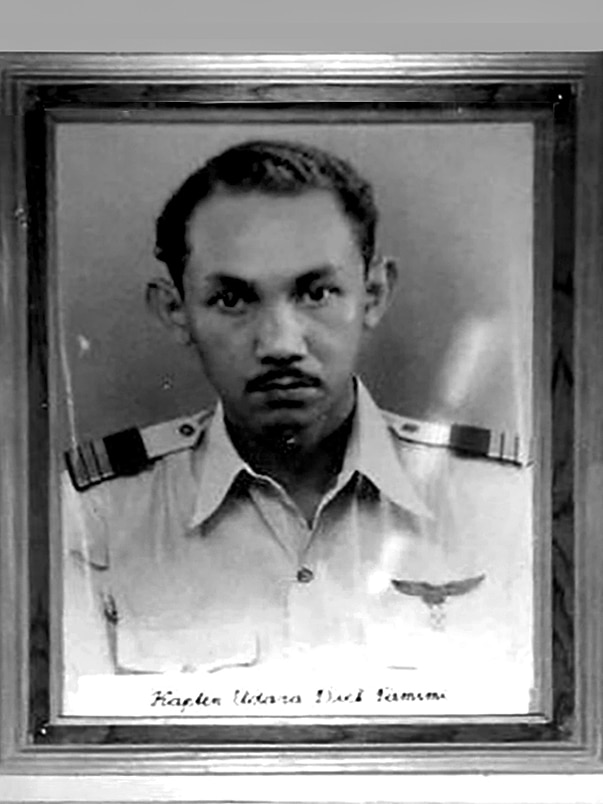 Black and white portrait of Dick Tamimi in his Air Force uniform in 1951.