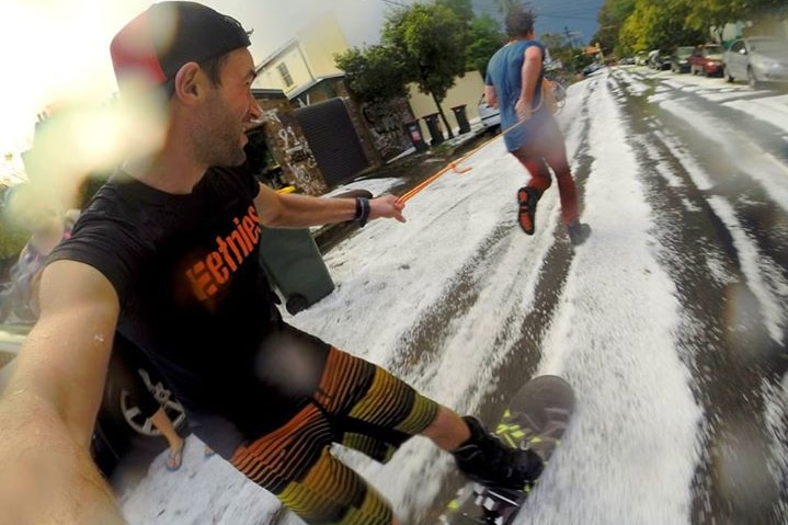 Snowboarding hail in Newtown, Sydney on April 25, 2015