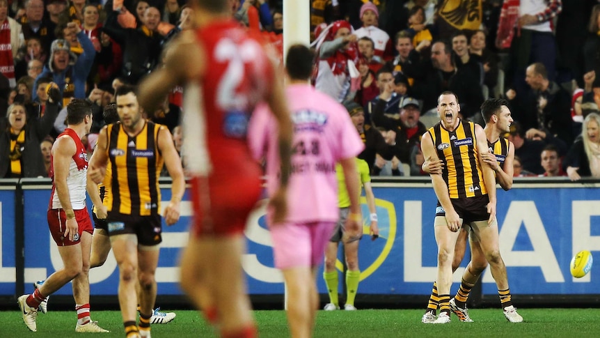 Jarryd Roughead celebrates a goal against the Swans