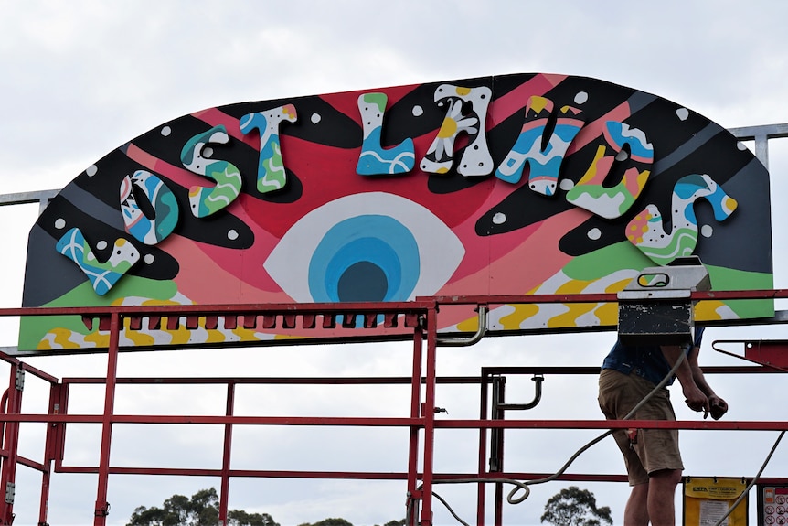 Colourful festival sign which reads 'lost lands'