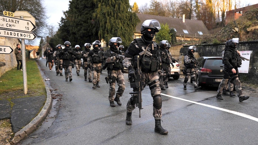 Police in Corcy during search