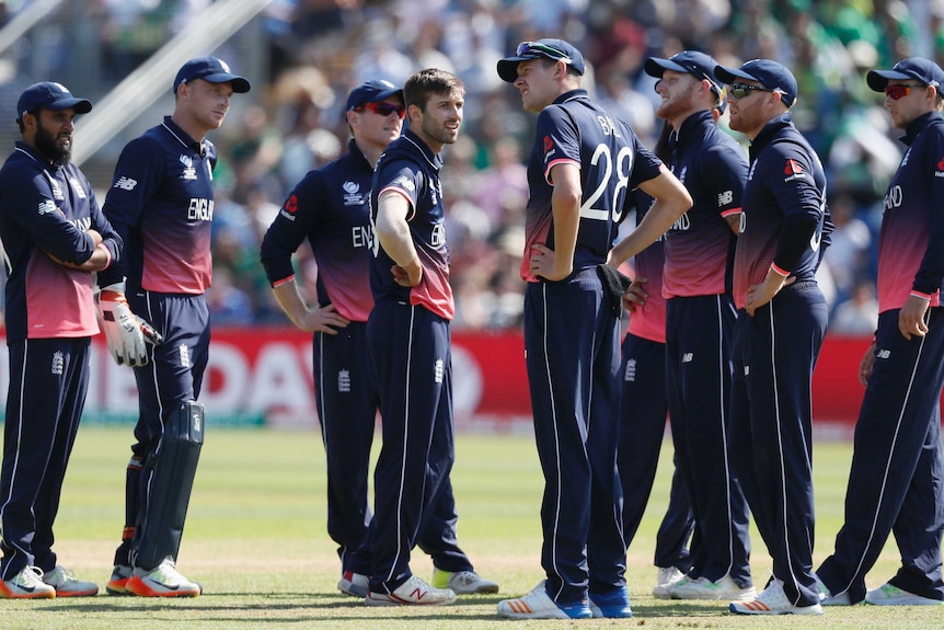 England players look on during loss to Pakistan in Champions Trophy
