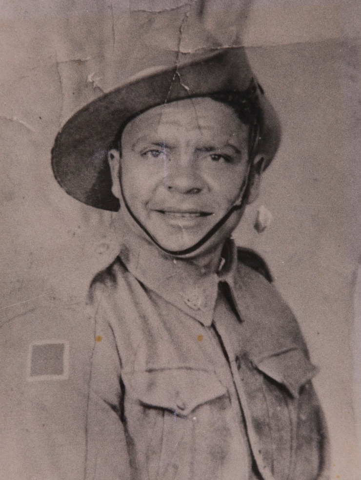 An Indigenous man in a military uniform.