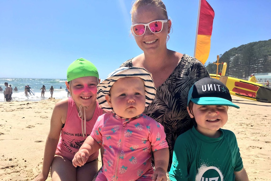 The Bernklev family building sand castles at Burleigh