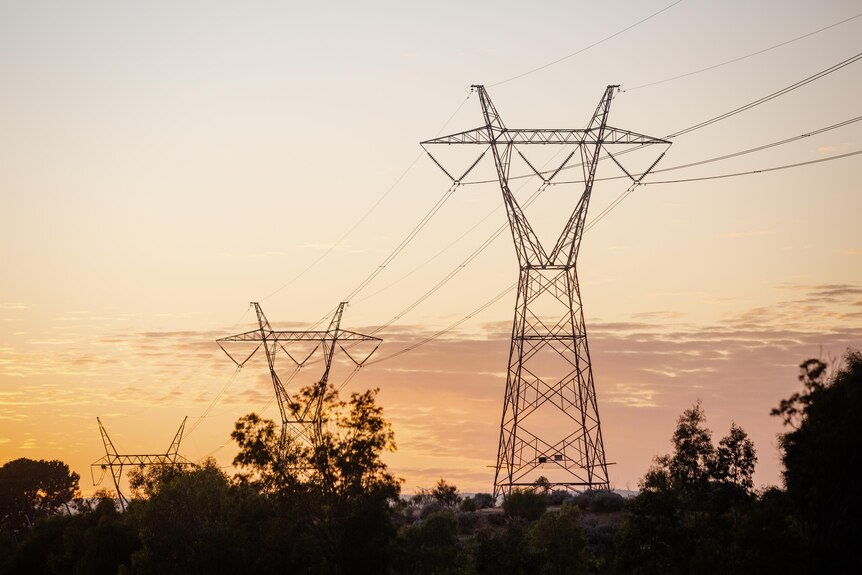 Power lines at sunrise in the Perth suburb of Treeby.