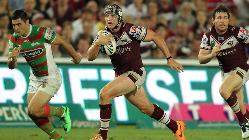 Manly's Jamie Buhrer runs with the ball against South Sydney in Gosford.
