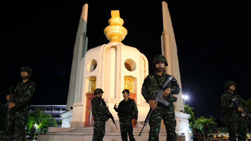 Thailand army soldiers take positions in front of the Democracy monument in Bangkok on May 22, 2014.