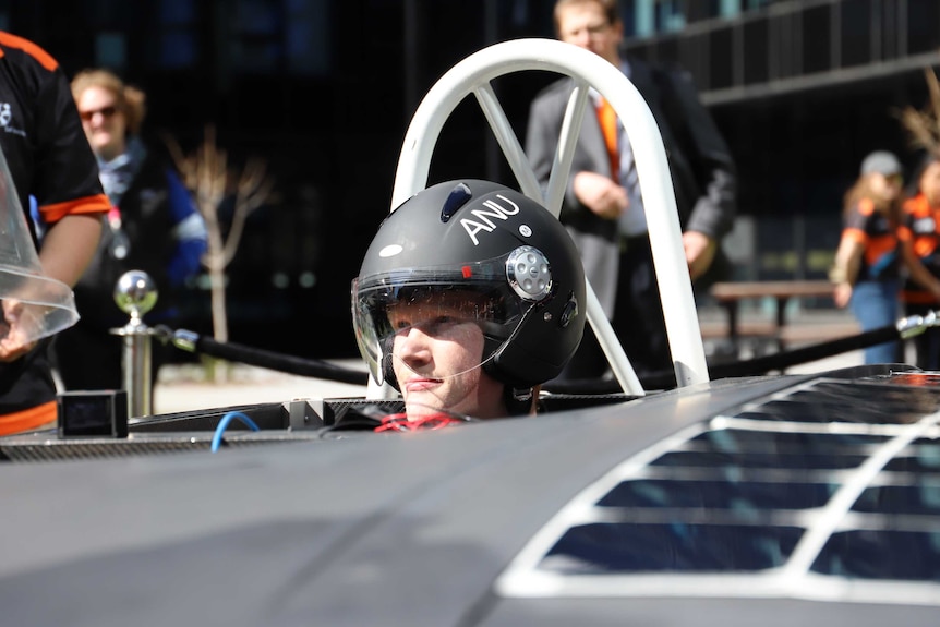 A driver sits in the 'Super Charge', the Australian National University's first entry into the World Solar Challenge.