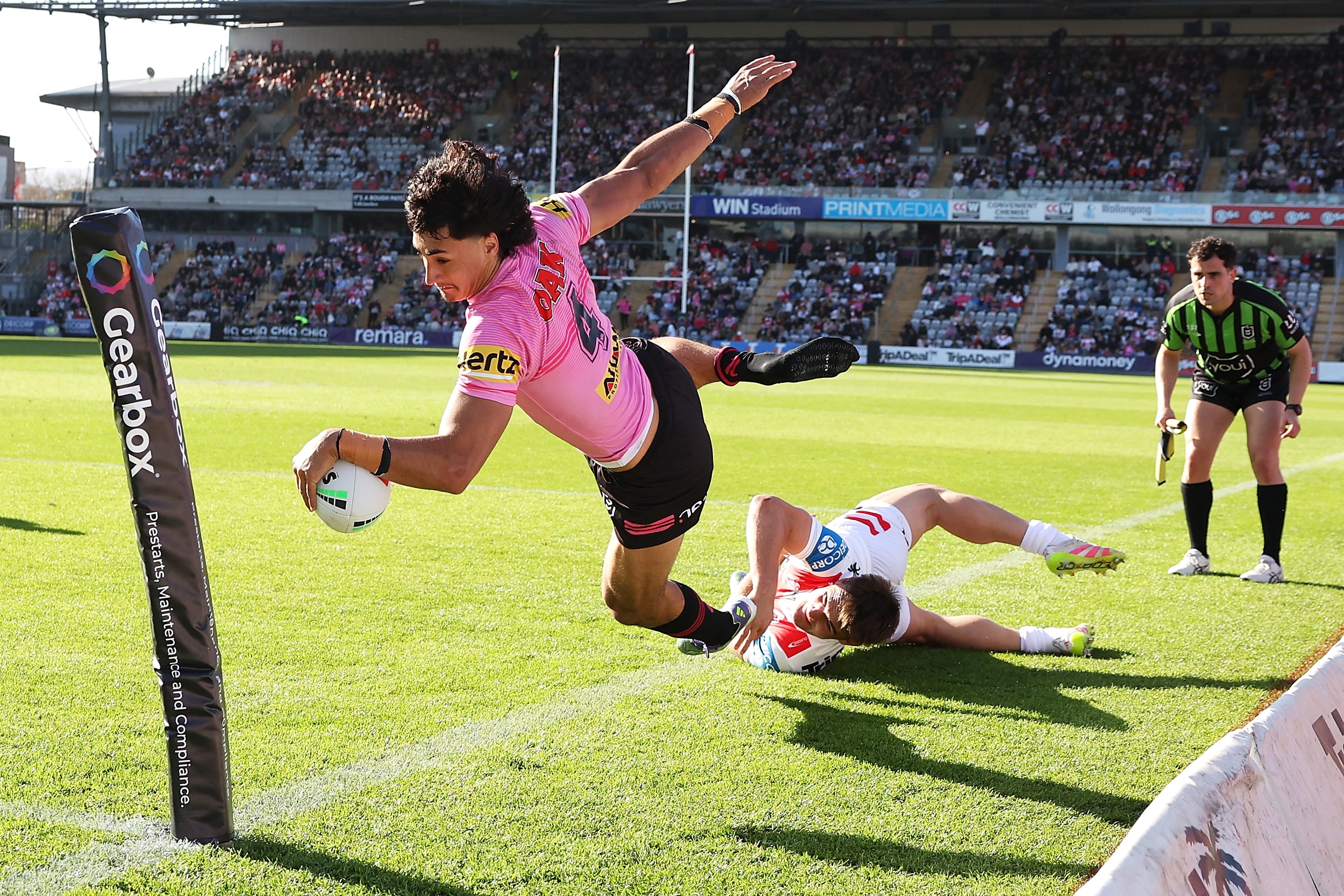 Casey McLean reaches out to score a try against St George Illawarra