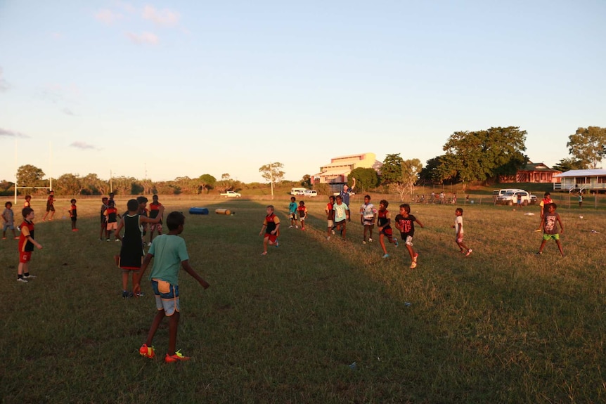 Mornington Island children playing football.