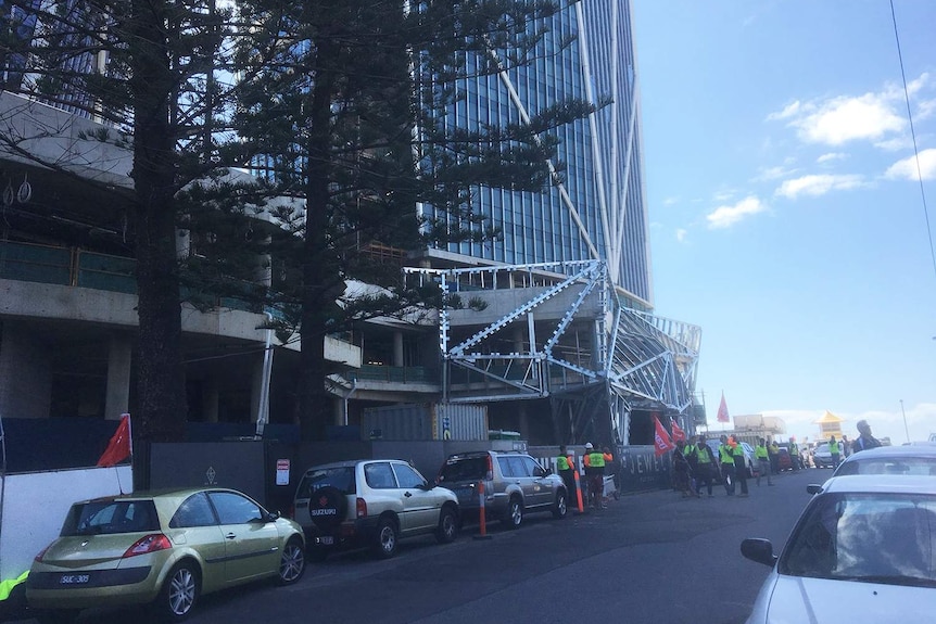 Union and construction workers with banners outside $1 billion Jewel development at Surfers Paradise on October 4, 2018.