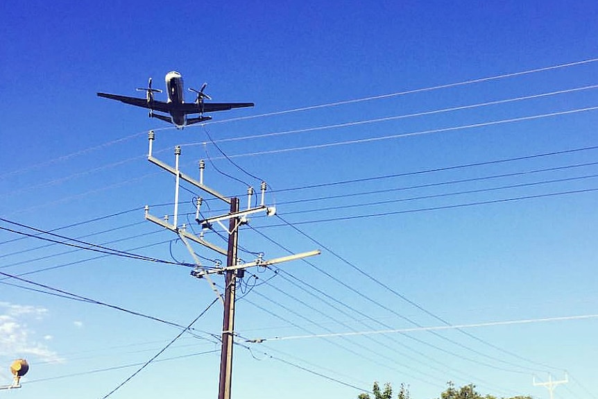 Plane approaches Adelaide Airport.