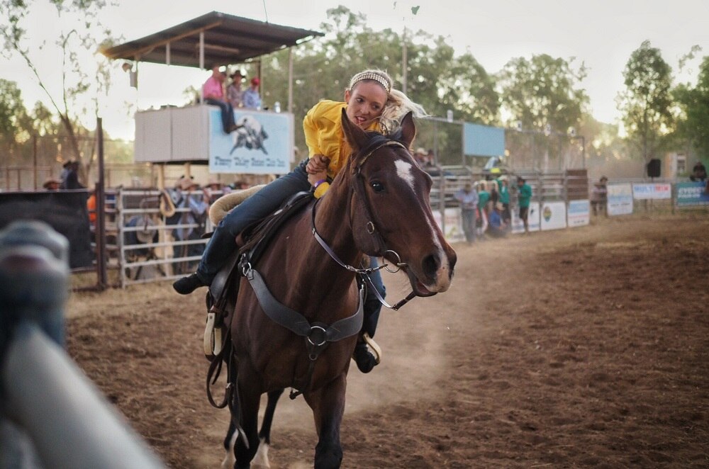 Dare devil trick riding wows crowd at remote Fitzroy Crossing Rodeo ...