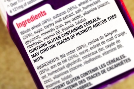 Cereal package listing ingredients and health warnings.