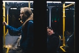 A young woman holds onto a railing on a bus. A man is in the background.