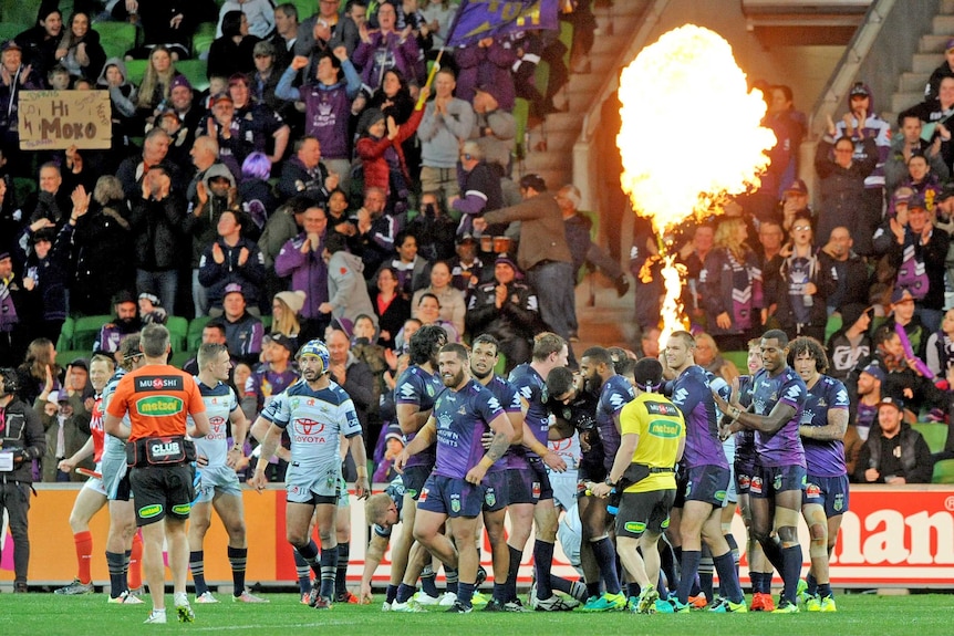 Melbourne Storm celebrate a try against North Queensland Cowboys