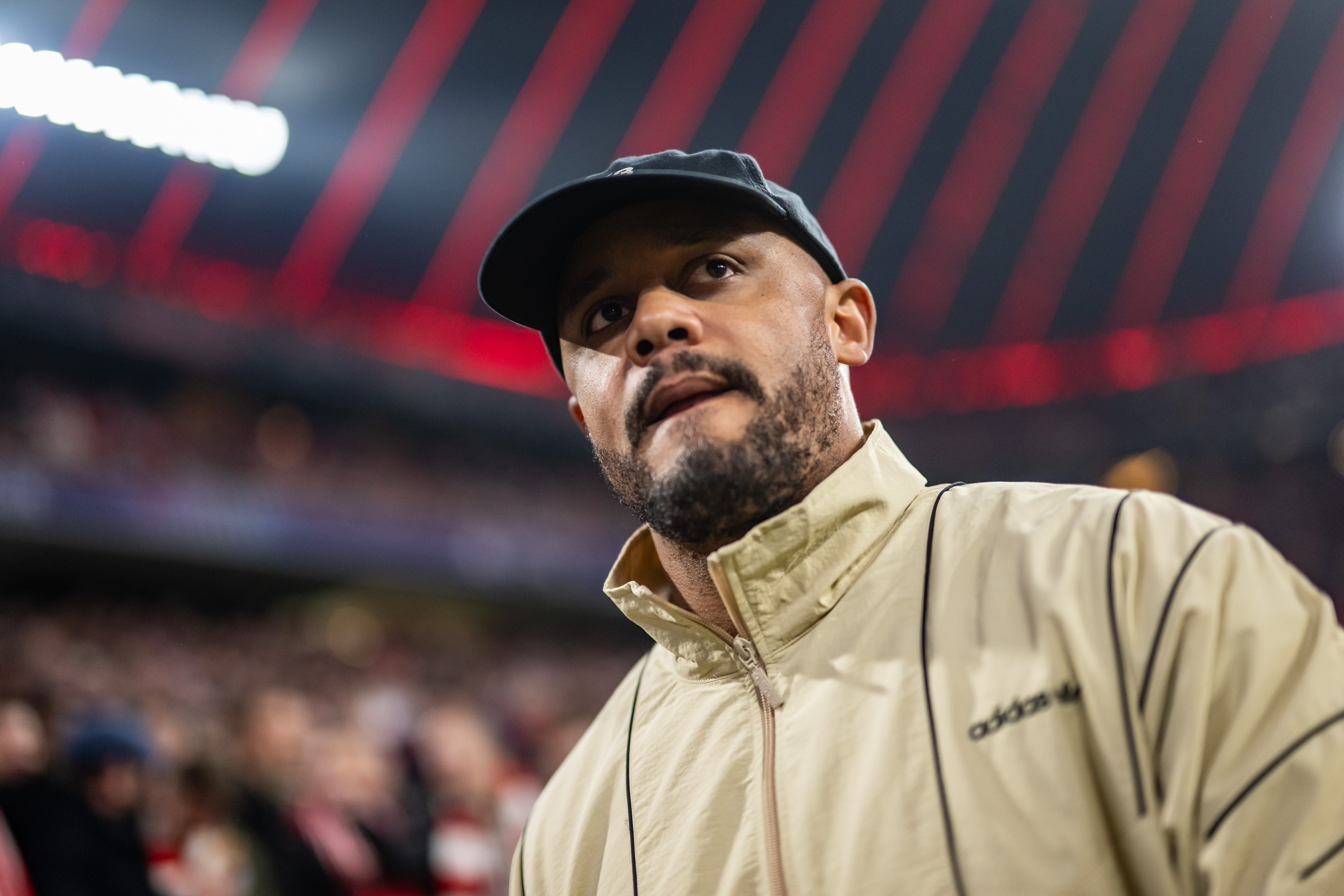 Vincent Kompany looks to one side