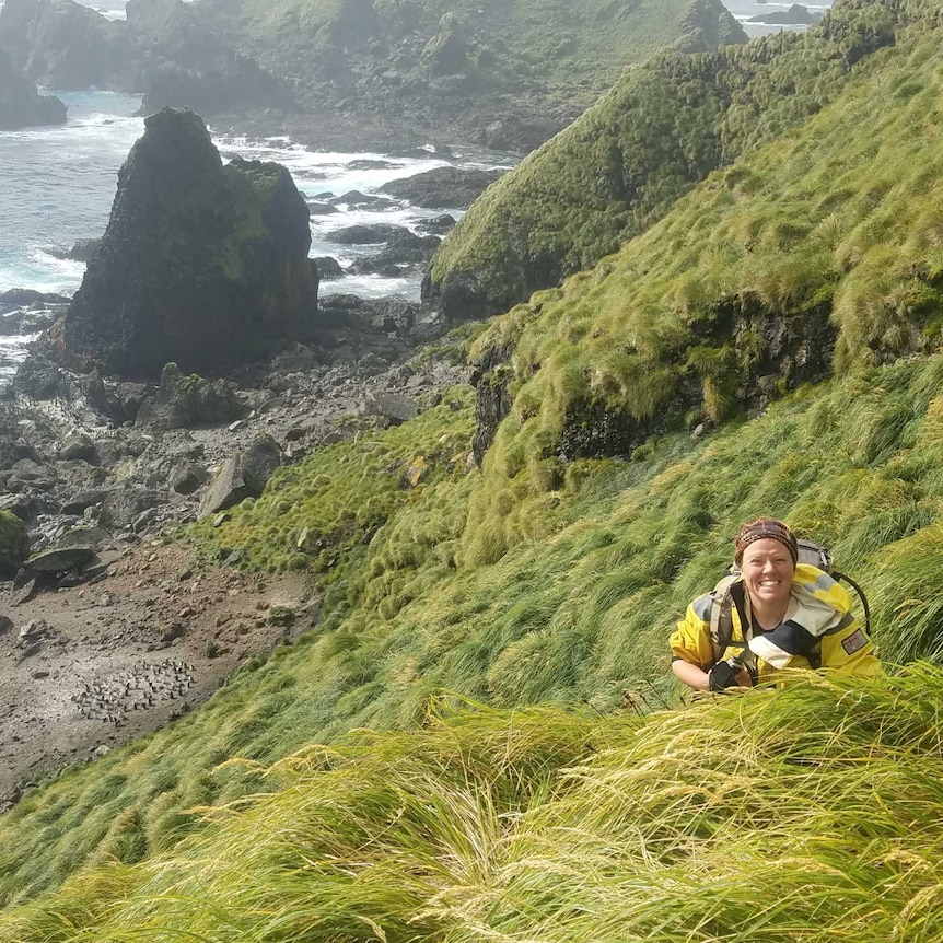 Melanie Wells volunteering on Macquarie Island for the Australian Antarctic Division dressed in exploration gear