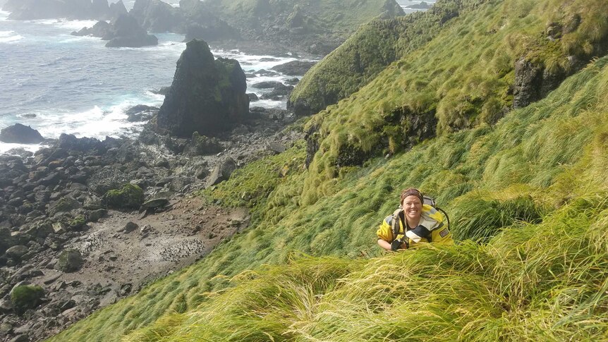 Melanie Wells volunteering on Macquarie Island for the Australian Antarctic Division dressed in exploration gear