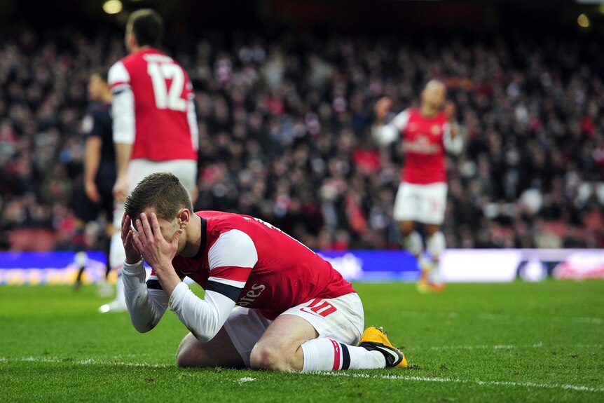 More agony ... Jack Wilshere reacts after Arsenal missed a late chance in its 1-0 FA Cup loss to Blackburn.