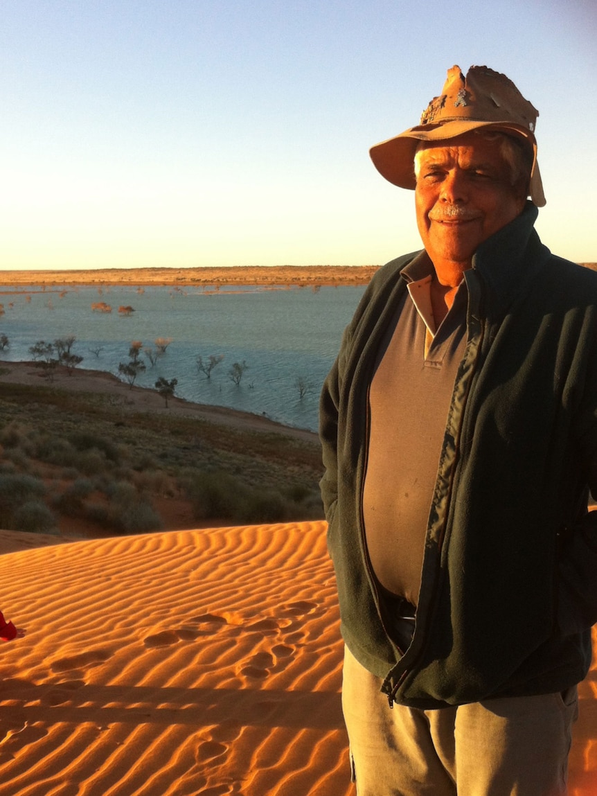 Indigenous elder Don Rowlands says tourists appreciate hearing the traditional story of how water wells were created in the Simpson Desert.