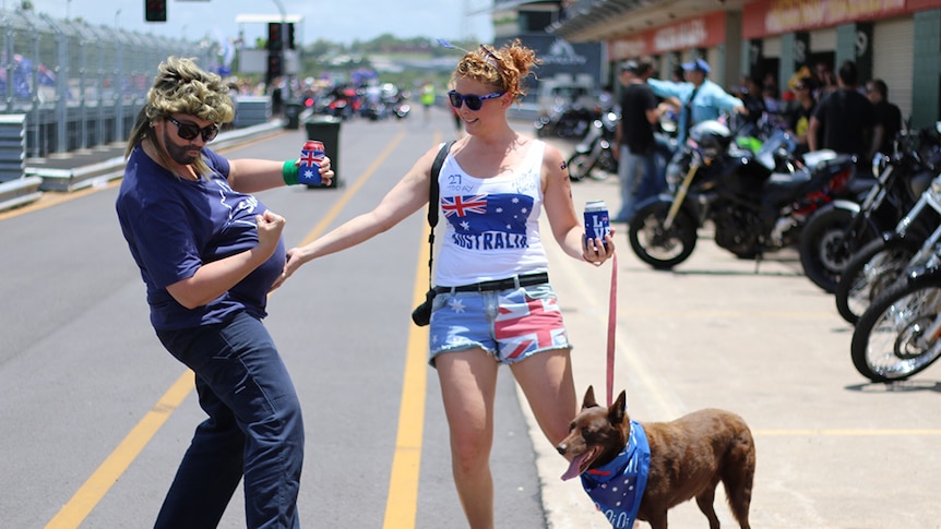 A spectator struts their stuff at Darwin's Australia Day ute muster.