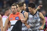 Steve Johnson surrounded by Geelong Cats