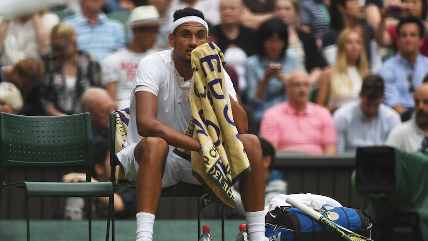 Nick Kyrgios looks on during Wimbledon loss to Andy Murray