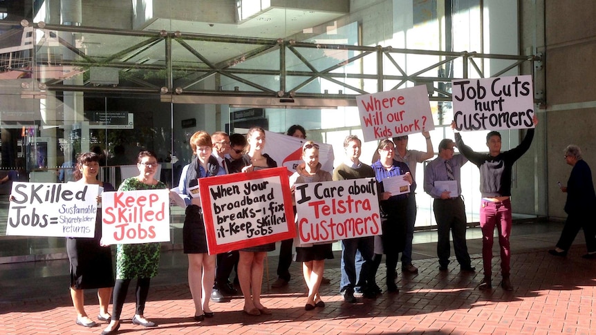 CPSU protesters gather outside the Telstra AGM in Sydney.