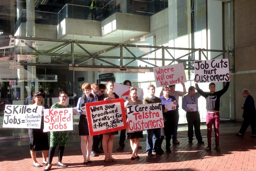 CPSU protesters gather outside the Telstra AGM in Sydney.