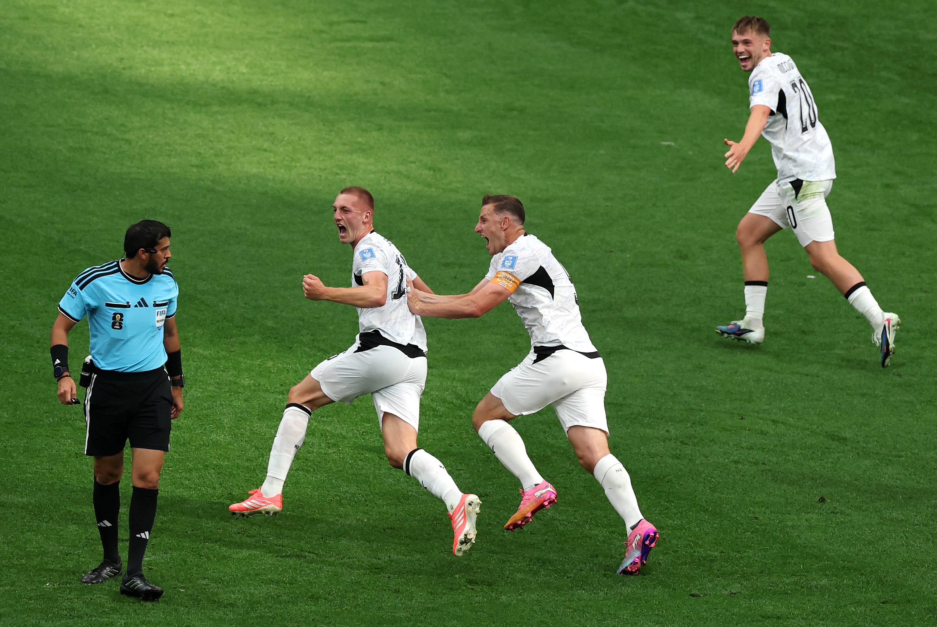 Finn Surman celebrates