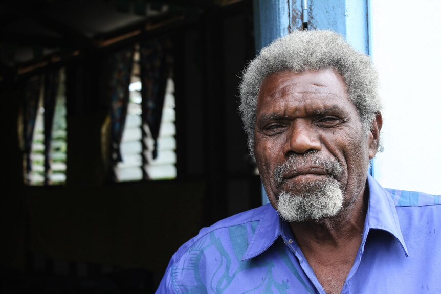 Samson Numake, a man from Tanna on Vanuatu, poses for a photo.