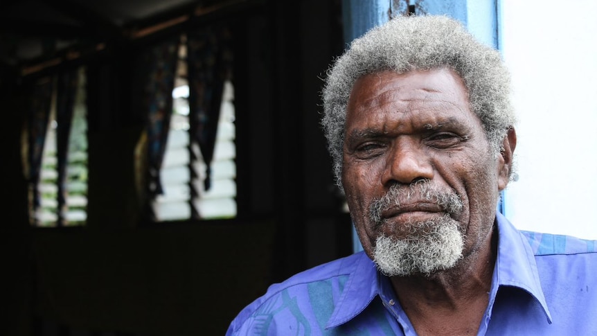 Samson Numake, a man from Tanna on Vanuatu, poses for a photo.