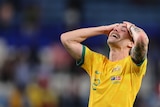 Jackson Irvine of Australia reacts as he celebrates the 1-0 victory and passage to the knockout stages