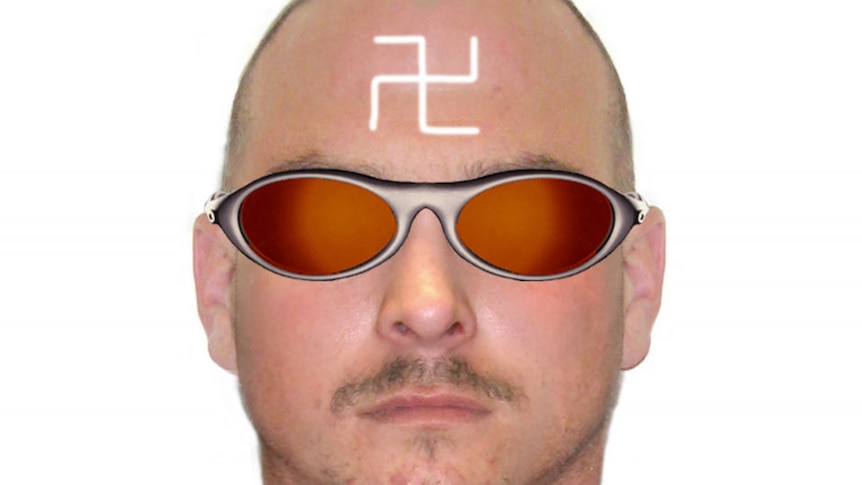 A middle-aged white man wears orange sunglasses and has a white swastika on his forhead.