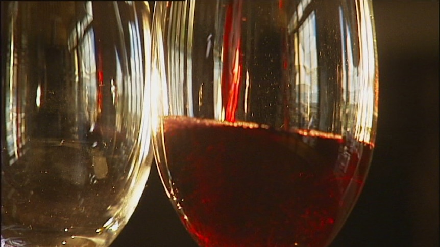 Pouring a glass of Tasmanian wine.