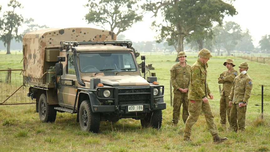 Australian Defence Force personnel with an ADF truck parked in South Australia's south-east