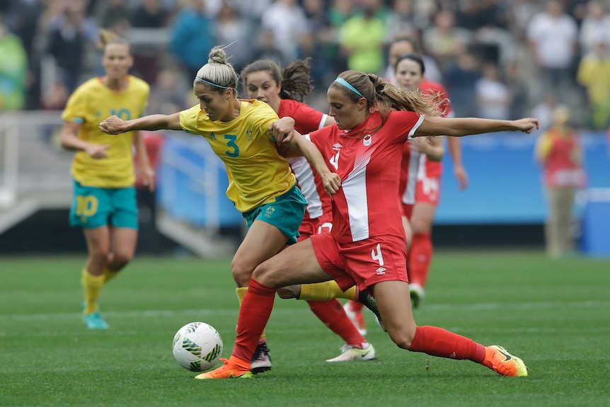 Katrina Gorry battles for the ball